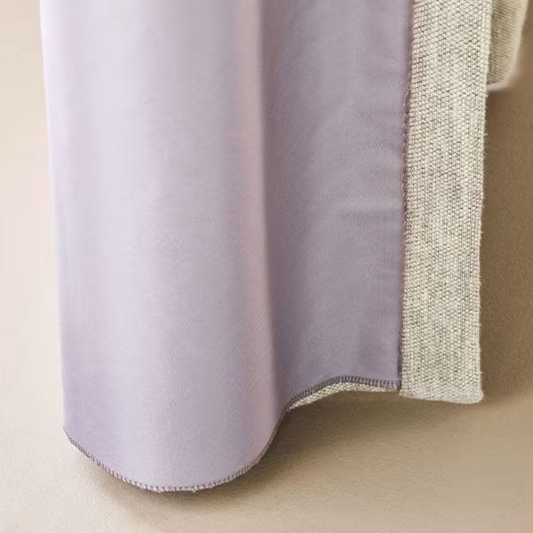 Foto van gevoerde gordijnen. Super isolerend